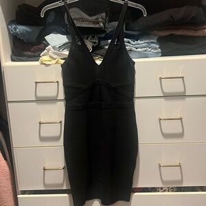 Guess black body con dress with slight stains removable with a wash